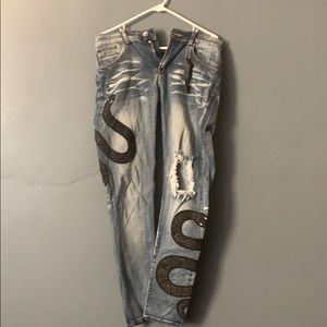 Snake-Embroidered distressed skinny jeans